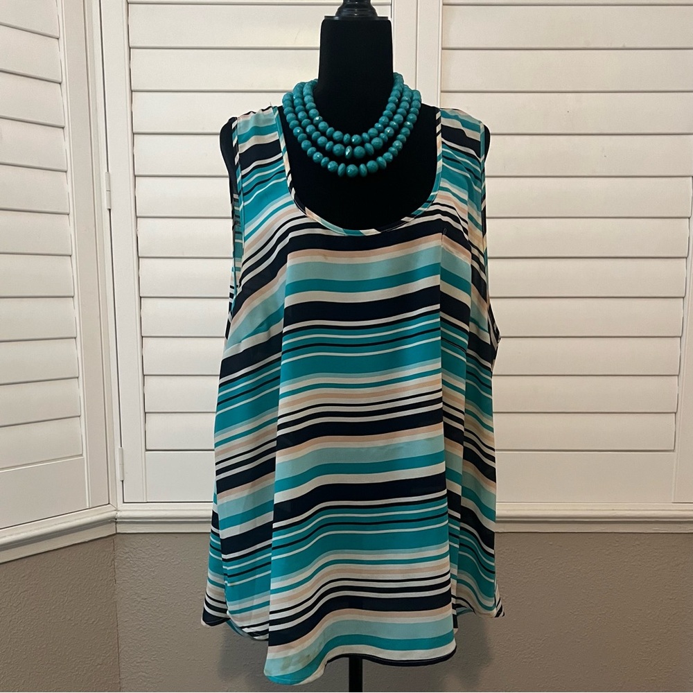 Blue and white striped tunic tank top. Has minor snagging.